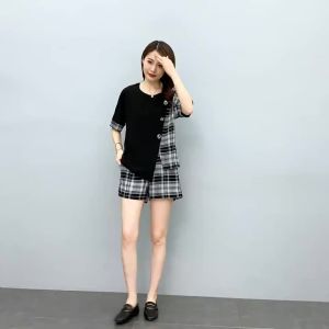 2025 Thời trang mùa hè mới bộ đồ ngắn nữ tính áo sơ mi rộng áo tay ngắn quần bộ hai mảnh cho phụ nữ