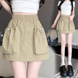 Chân váy kaki chữ A túi hộp hot trend 2024  Chân váy kiểu nữ có quần trong túi rút lưng chun-XMTĐ