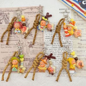 NOVAWEAR ตลก ตุ๊กตาดาวพวงกุญแจ ลูกปัด แขวนกระเป๋า สายคล้องโทรศัพท์มือถือ การ์ตูน ของตกแต่ง ที่ห้อยกุญแจรถ ตกแต่งกระเป๋า