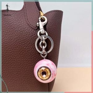 🔥ส่วนลด 10 บาท สำหรับการซื้อ 1 ชิ้น🔥ราคาถูก ใหม่พวงกุญแจลูกตาเรซินฮาโลวีนกระเป๋าจี้กระเป๋าเป้สะพายหลังตาปีศาจเสน่ห์เครื่องประดับแขวน