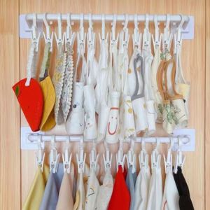 Kẹp nhựa kẹp tất vớ tã lót treo đồ áo khoác kẹp rèm xoay kẹp trưng bày móc xoay kẹp cà vạt chéo