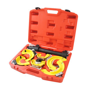 Damper spring compressor removal tool with sleeve