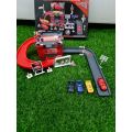 TRO463 MCQUEEN NEW PARKING GARAGE TRACK +4 CARS SET (CB660-80). 