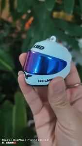 Mini LED helmet keychain with colored face mask and key ring lightweight and multifunctional mini night light pendant.