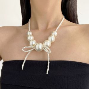 TKNUS พูดเกินจริง สร้อยคอลูกปัดโบว์ ไข่มุกเทียม สง่างามเรียบหรู โซ่กระดูกไหปลาร้า ขั้นสูงเป็นขั้นสูง ปลอกคอแสดงข้อความ สร้อยคอไข่มุกขนาดใหญ่ สำหรับผู้หญิงผู้หญิง