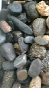 1 lilogram original natiral stone from jungle fast flowing river. Unbleach with natural pebble stone looks suitable for aquascaping and gardening
