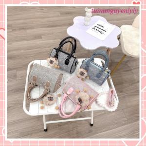 Túi xách nữ Lyly túi trống đeo chéo kèm charm bông họa tiết thời trang K310