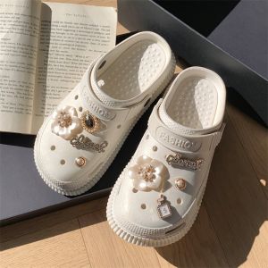 👑 รองเท้าหัวโต H25-5G0 รองเท้าแตะผู้หญิง แบบสวมรัดส้น พร้อมตัวติดดอกไม้ประดับเพชร 👑SUNBALEE