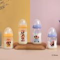 Bình Sữa Pigeon Softouch PP Plus Disney Baby  - Màu Vàng 160ml/240ml. 