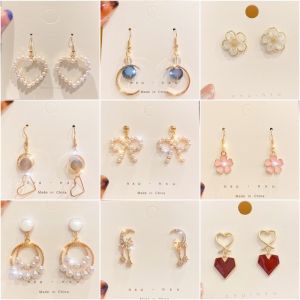 【ZEVER】ต่างหูอารมณ์ระดับไฮเอนด์สำหรับผู้หญิง 2025 แบบใหม่ฤดูใบไม้ร่วงและฤดูหนาวต่างหูยาวต่างหูพู่หรูหราเบา ๆ