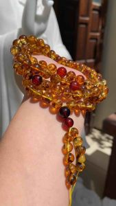 Chuỗi hổ phách hoa tự nhiên 108 viên hàng 86li. Chuỗi hạt lớn niệm Phật.