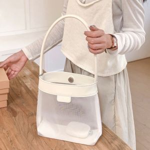 DOIFU น้ำหนักเบา กระเป๋าตาข่ายแบบถัง หนัง PU ง่าย กระเป๋าสะพายข้าง ลำลอง ความจุขนาดใหญ่ กระเป๋าใส สาวๆ