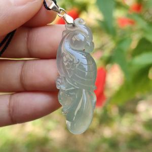 Premium Old Pit Rare Green Hue Icy Translucent Natural Type A Jadeite Jade crafted with Parrot as Pendant for the collectors certificate weigh 6.25 grams measurement 41.6 * 15.2 * 6.5 mm (pendant213)