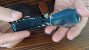 Portable Stainless Steel Foldable Shoe Horn Tool with Faux Leather Handle Design For Travel And Home Shoe Accessories