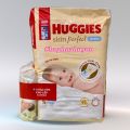 Tã dán sơ sinh Huggies size 4-8kg Mẫu mới Skin Perfect 54 Miếng tặng kèm khăn ướt - Hàng Chính Hãng. 