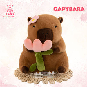 gấᴜ Bông Capybara Tai thỏ cầm trà sữa Chuột Lang mê trà sữa