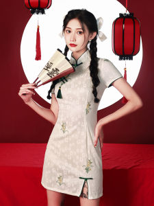 Elegant Floral Cheongsam Dress with Tassel Detail and Mandarin Collar