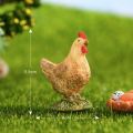 Đàn gà mẹ gà con gà trống mái và trứng trong tổ - mô hình trang trí tiểu cảnh. 