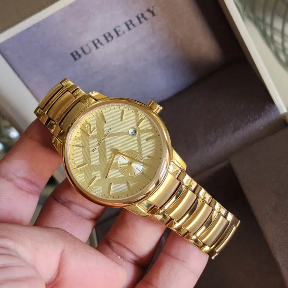 Burberry gold store bracelet watch