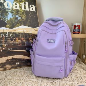 AE New style school bag for female college students solid color large capacity multi-layered sturdy backpack for middle and high school students