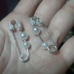 silver earrings safety pin design with pearl