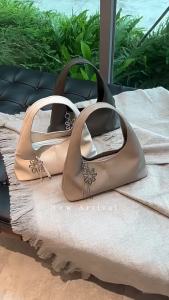 SAIME Taiwanese niche new womens handbag textured round shoulder tote bag soft bag with simple floral pendant shoulder bag
