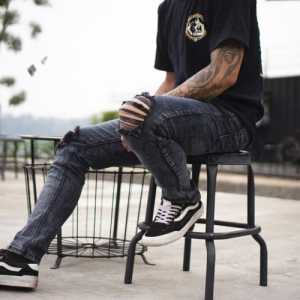 Celana jeans panjang pria sobek lutut snow