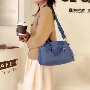 Angelwull Nylon Shoulder bags featuring a 2-way design for hand carrying or using as a sling-25833