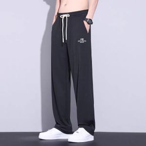 Quick-drying sports pants for men Mesh ice silk pants Mens summer thin loose-fitting cropped pants