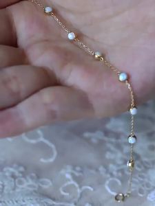 925 เงินแท้ชุบ 14K สีทอง 7 สร้อยข้อมือโอปอลสำหรับผู้หญิง ดีไซน์หรูหราเบาๆ สไตล์วินเทจ ins จิวเวลรี่มือ