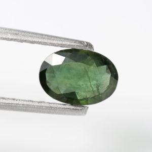 0.80 ct พลอยแท้ เขียวส่อง เผาเก่า ทรงไข่ บางกะจะ จันทบุรี