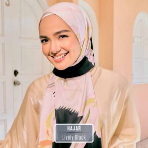 Alhumaira Hajar Long Shawl Velvet Satin Silk that is very soft and sleek Easy to style with stellar draping embellished with classic metal tag with non other signature neat baby seam.