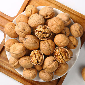 ถั่ววอลนัทเปลือกบางทานอร่อย เปิดโดยการบีบ เปิดด้วยการหยิกเพียงครั้งเดียวกรัมราคา核桃วอลนัท