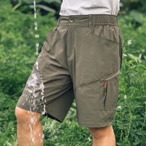 กางเกงขาสั้นเก็บผ้าร่มกันการฉีกขาดสำหรับผู้ชายกางเกงขาสั้น พร้อมกระเป๋าสำหรับใส่เล่นกอล์ฟเดินเขา ยุทธวิธีกันน้ำได้