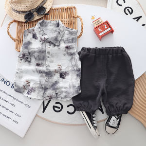 เสื้อผ้าเด็กผู้ชายเด็กแฟชั่นฤดูร้อนสไตล์จีนเสื้อเชิ้ตและกางเกงขาสั้นแขนกุดสำหรับเด็กผู้หญิงชุดเด็กเล็กใส่ได้ทั้งชายและหญิงชุดผ้าฝ้าย2ชิ้น