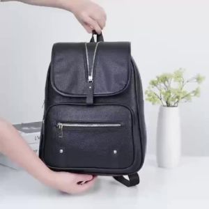 FRIDA BAGS#6002 Functional leather backpack design with a distinctive vertical zipper on the flap