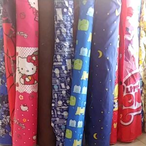 SETENGAH METER Bahan kain Polimicro Disperse Kain Meteran Motif Karakter (05m)