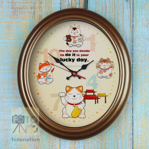 Chiming Melody Wall Clock with Maneki Neko Lucky Cat. "The day you decide to do it is your Lucky Day. -Japanese proverb". Melody hourly alarm.
