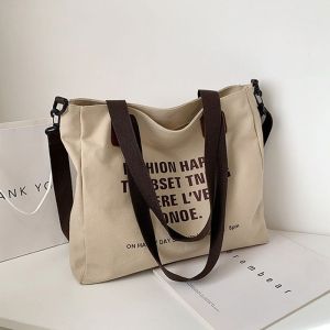 Sheii สต๊อกแน่นมาก กระเป๋าสะพายข้างแฟชั่น พิมพ์ลายตัวอักษร สีมินิมอล เข้าได้กับทุกการแต่งกาย ขนาดใหญ่จุของได้เยอะน้า วัสดุดีทนทาน ต้องมี