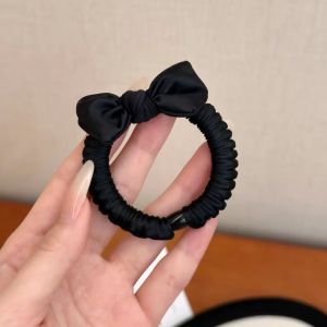 โดนัทมัดผมยืดหยุ่นได้สูงยางรัดผมรูปโบว์ซาตินสไตล์เกาหลีสำหรับสาวหวานที่รัดผมยางรัดทุกวัน