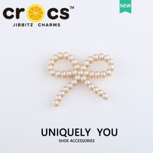 Jibbitz cross charm แท้ หัวเข็มขัดรองเท้า ประดับโบว์ แฟชั่นสไตล์ใหม่ อุปกรณ์เสริมรองเท้า 2024