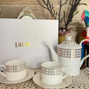 Elegant White Ceramic Tea Set with Geometric Pattern Cups and Saucers