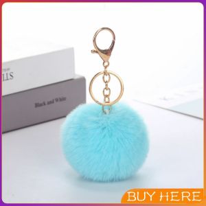 พวงกุญแจ จี้ลูกบอลหางกระต่ายน้อยน่ารัก สําหรับห้อยกระเป๋านักเรียน ขนาด 8cm Keychains BUY HERE