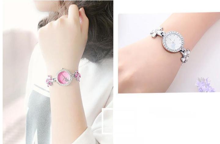 Đồng Hồ Nữ Cỏ 4 Lá Hình Tim Đính Đá Zircon Kiểu Lắc Tay ...