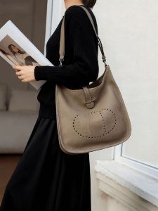 Top-layer cowhide womens bag large capacity hollow-out design fashionable and versatile suitable for commuting shoulder and crossbody bag