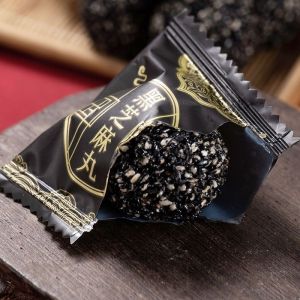 Sugar-free black sesame pills independent small package nine steamed and nine sun-dried sesame balls ready to eat after opening the bag high calcium and high dietary fiber