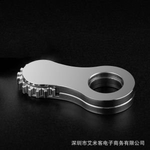 stainless steel finger spinner featuring a toothed design and a high-end oscillating ring