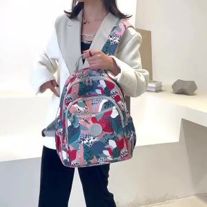 กระเป๋าผู้หญิงไนลอนกันน้ำความจุขนาดใหญ่กระเป๋าเป้สะพายหลังขนาดเล็กแบบพกพาแบบลำลองแฟชั่นกระเป๋าเป้สะพายหลังกลางแจ้งสำหรับการเดินทางของผู้หญิงอินเทรนด์