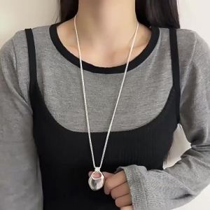 AE Japanese and Korean bloggers fever The same style saddle bag long necklace for women a light luxury niche sweater chain with a high-end feel accessory