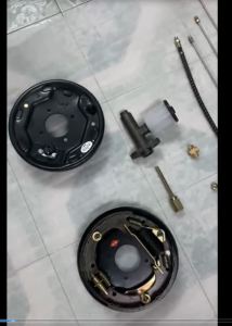 Bộ mâm dừng phanh dầu đầy đủ dùng lắp ráp và thay thế cho cầu liềncầu4 ốc 5 ốcvà các loại cầu chế